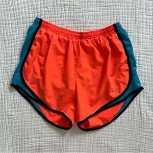 Nike Dri-Fit brief lined bright orange and blue women's running shorts; Medium